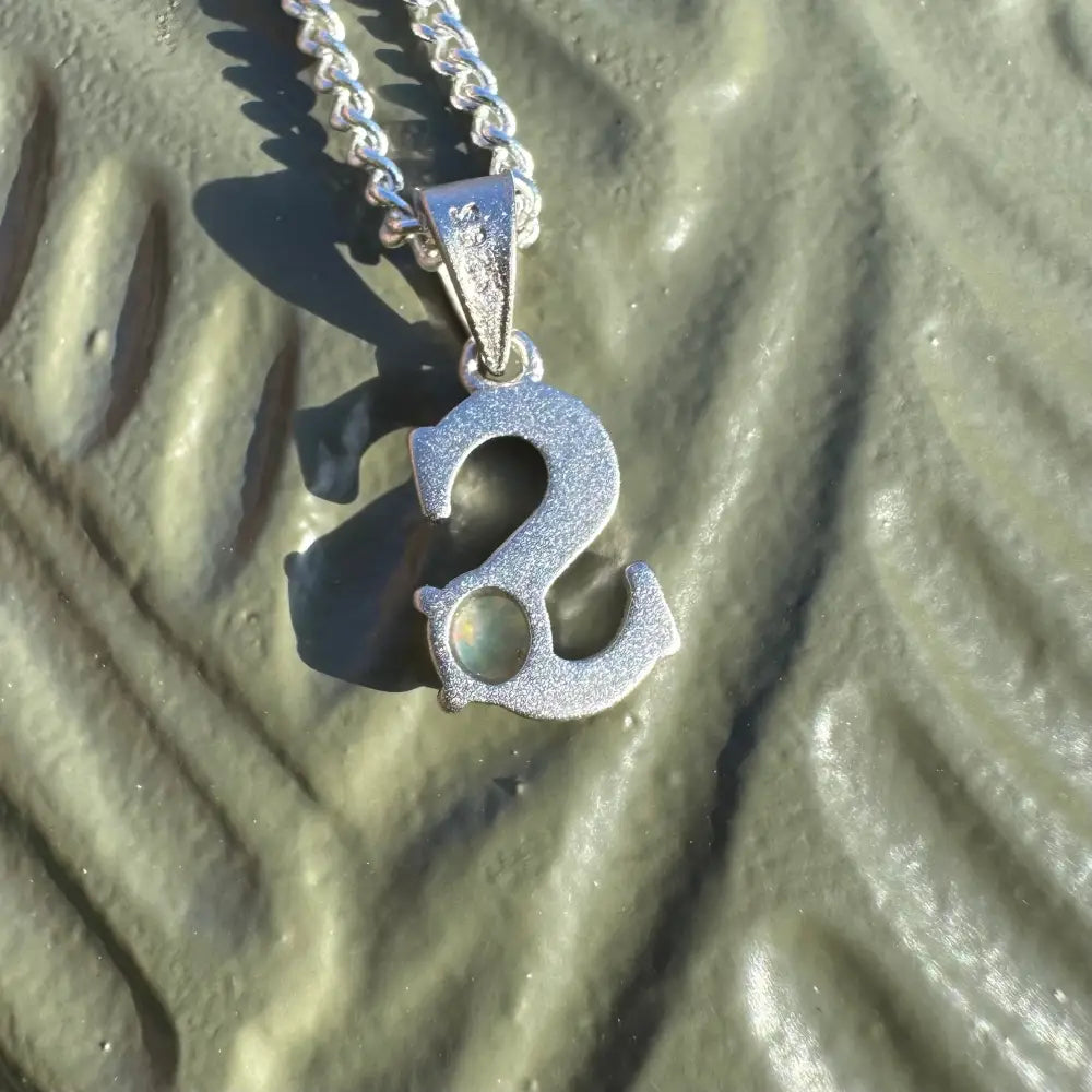 Silver number two pendant necklace featuring a handcrafted 0.2ct Lightning Ridge Opal in sterling silver