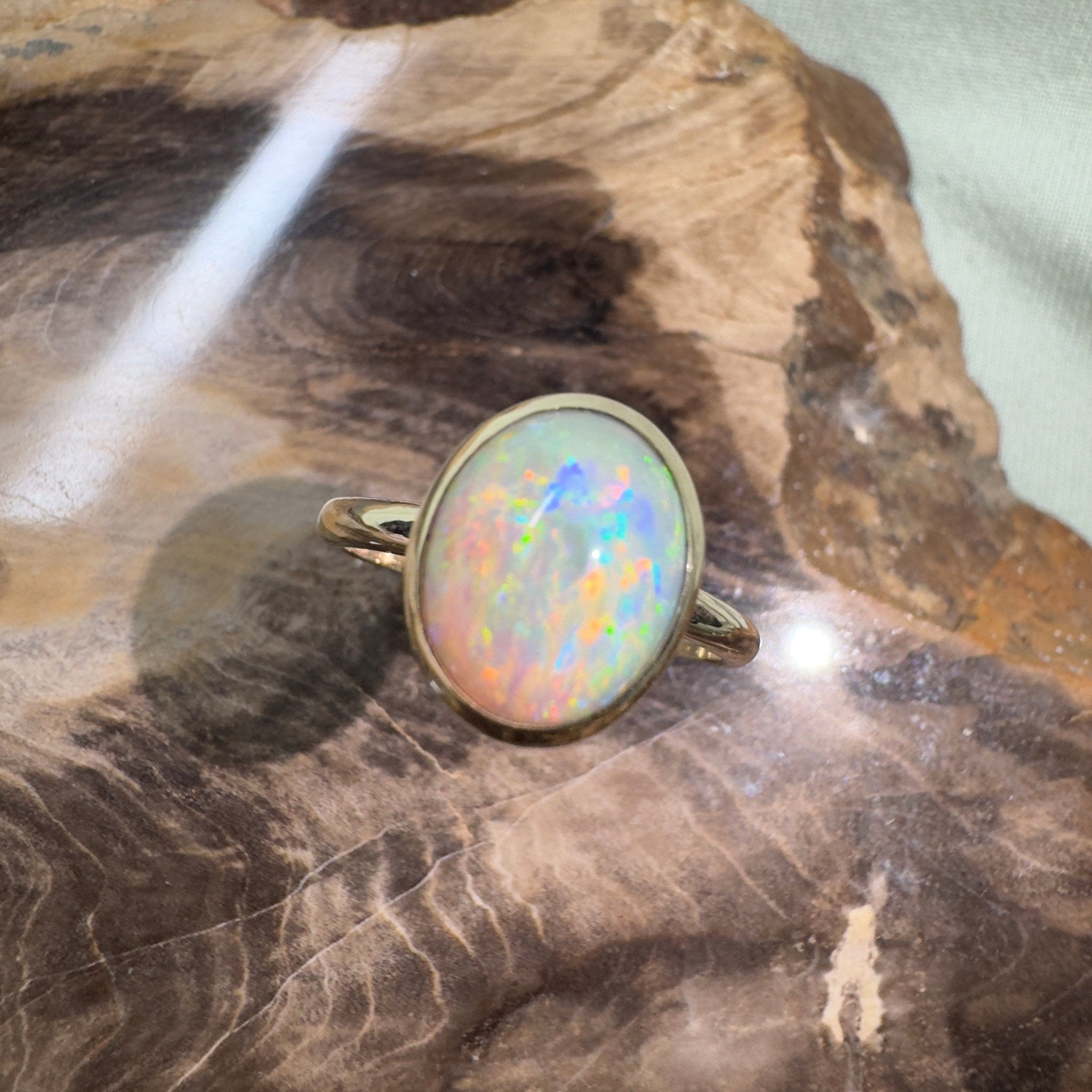 Simpson Halo ~ 3.3ct Solid Lightning Ridge Opal 9ct Yellow Gold Ring