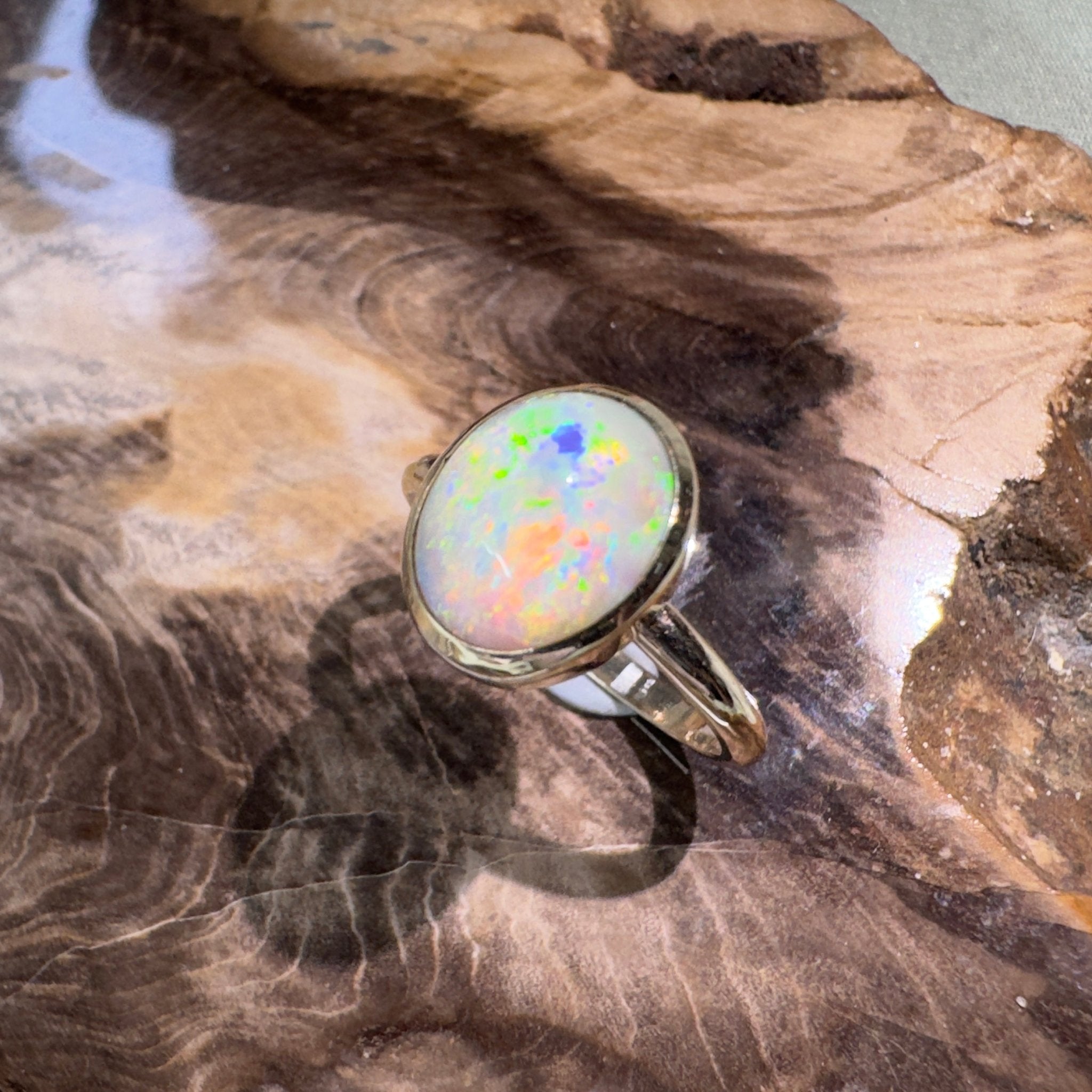 Simpson Halo ~ 3.3ct Solid Lightning Ridge Opal 9ct Yellow Gold Ring