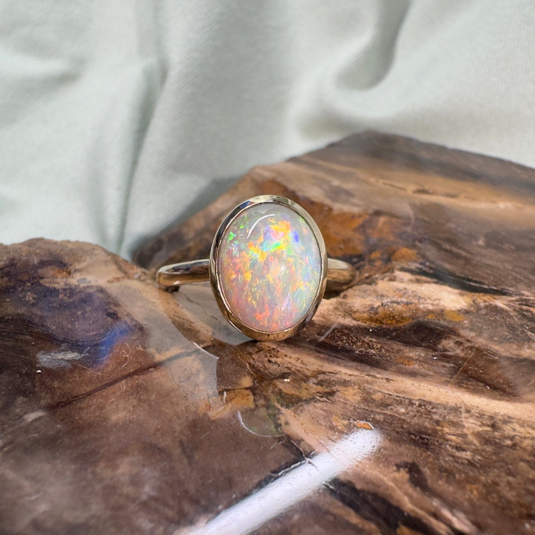 Simpson Halo ~ 3.3ct Solid Lightning Ridge Opal 9ct Yellow Gold Ring