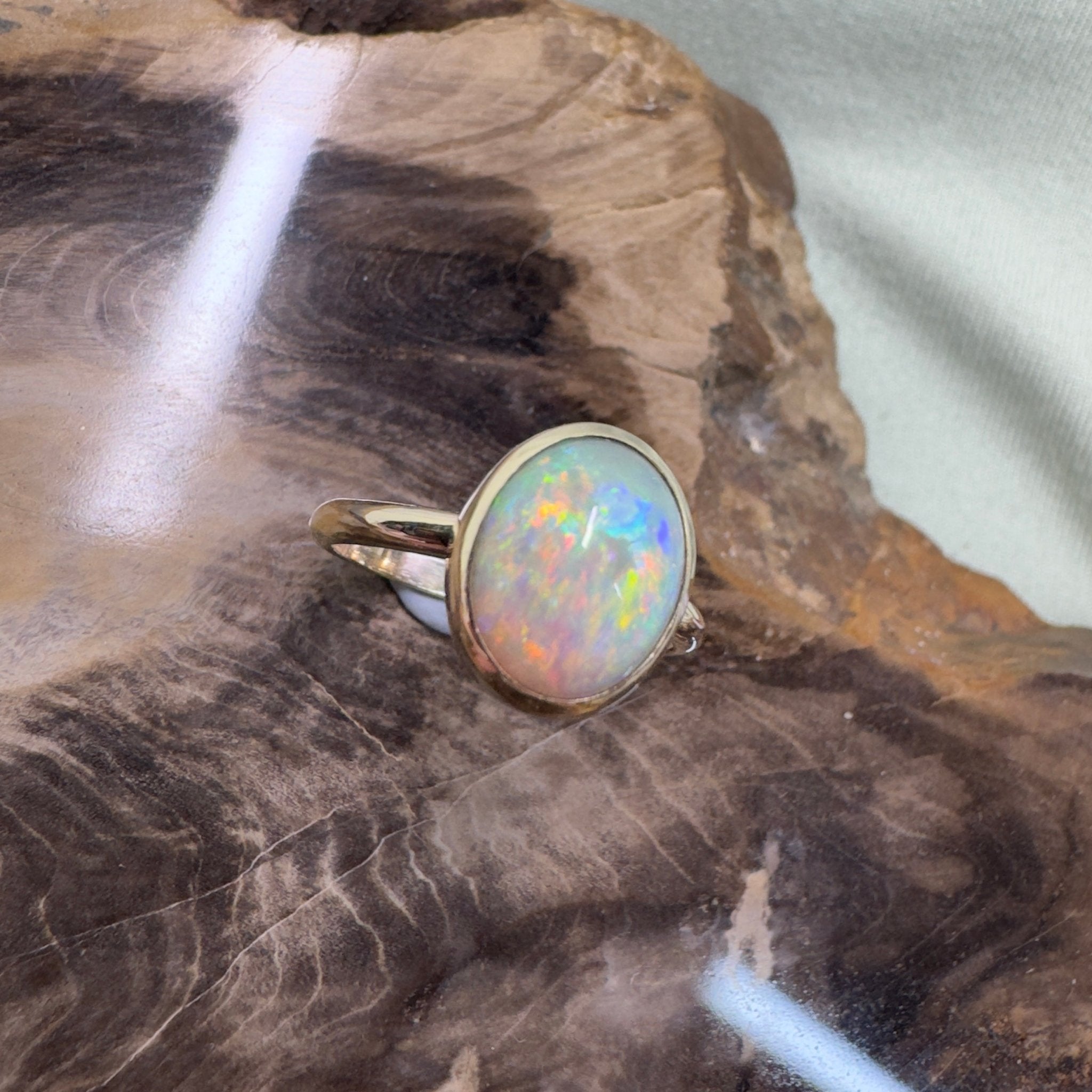 Simpson Halo ~ 3.3ct Solid Lightning Ridge Opal 9ct Yellow Gold Ring
