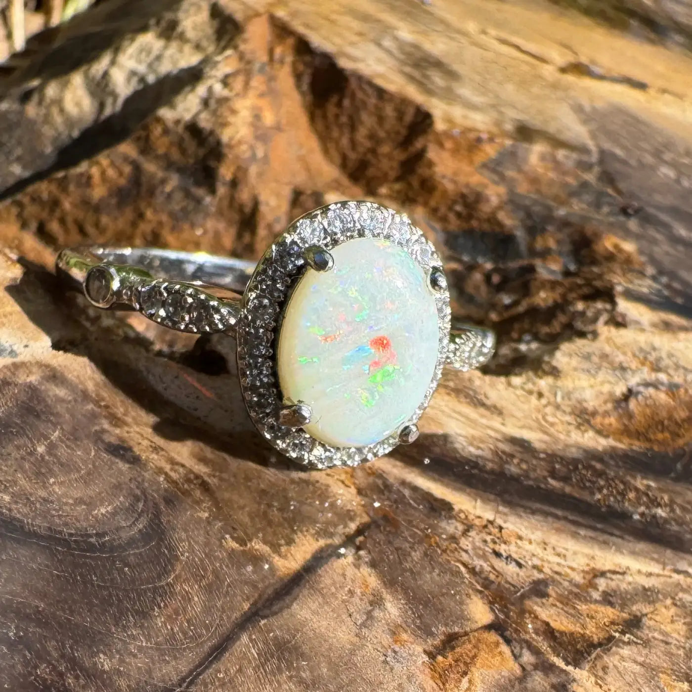Opal ring with diamond halo from Snowy Peaks handcrafted 1ct Coober Pedy Opal silver ring
