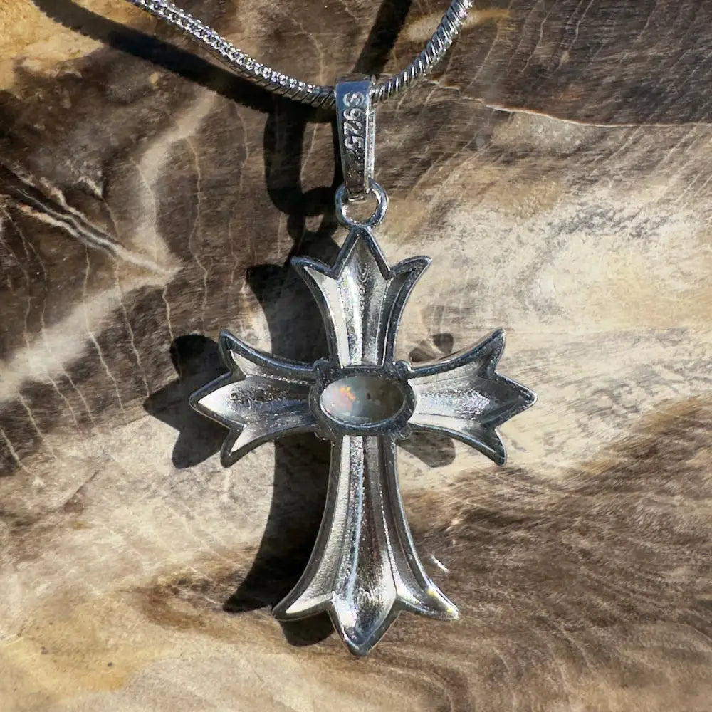 Silver cross pendant necklace.