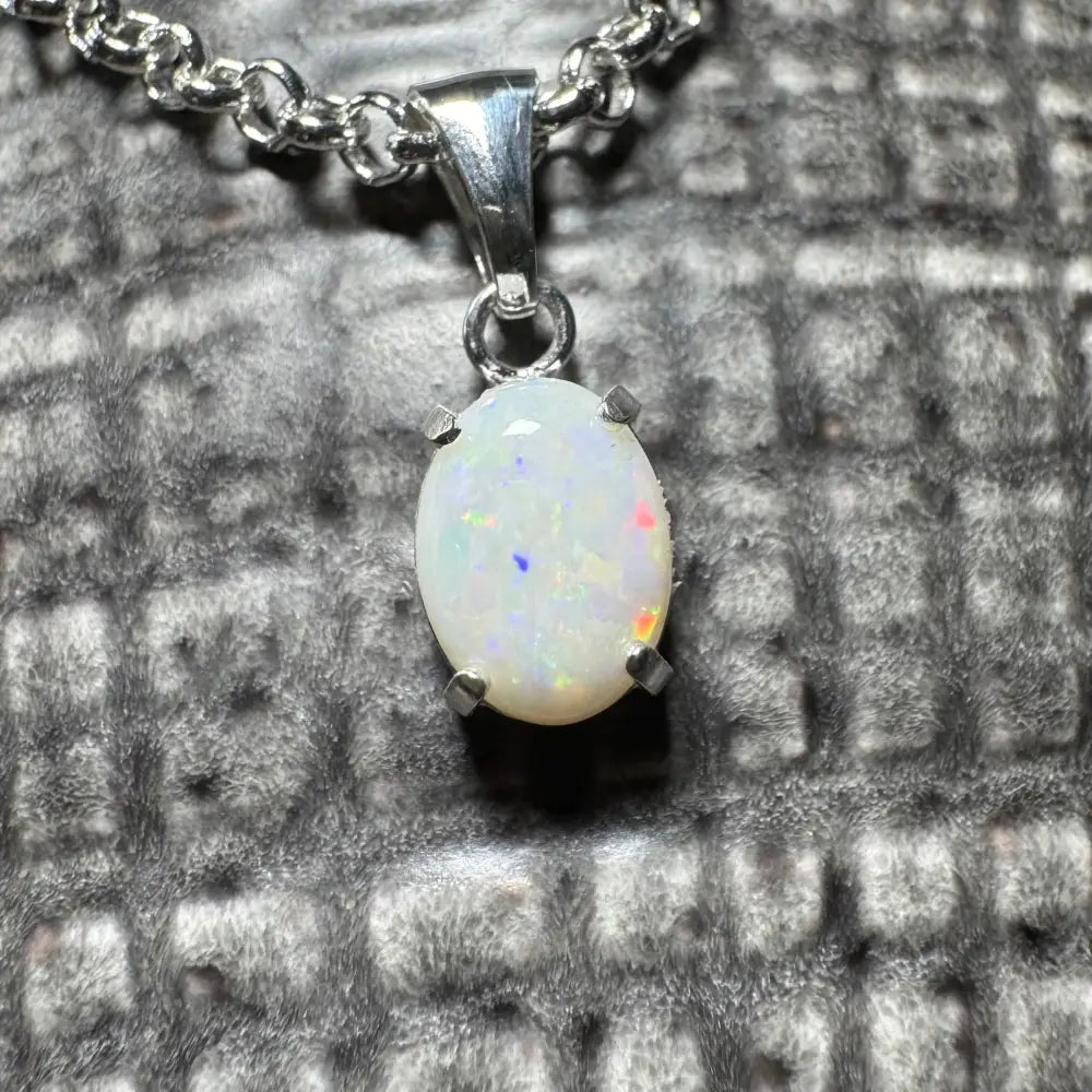 Oval opal pendant with silver chain from Three Sisters Shine handcrafted Coober Pedy opal necklace