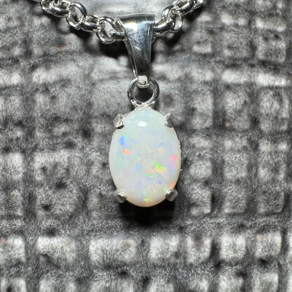 Silver opal pendant necklace with a 0.9ct Coober Pedy opal in sterling silver setting