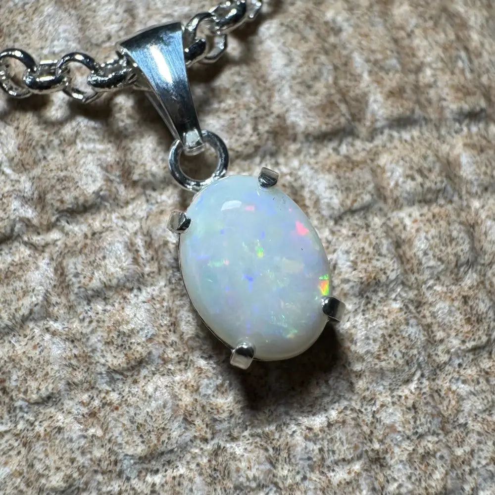 Oval opal pendant with silver setting from the Three Sisters Shine handcrafted necklace collection