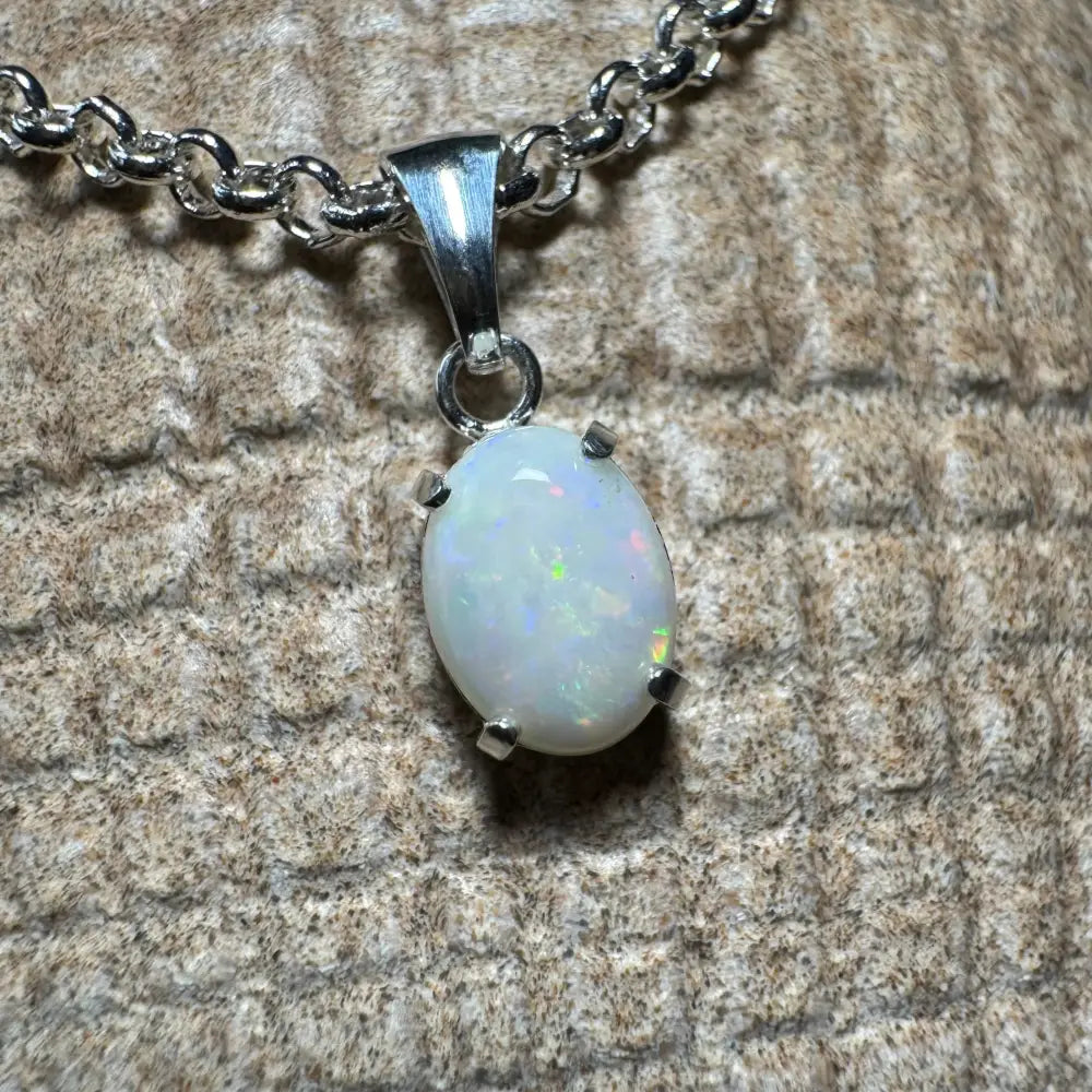 Silver chain necklace with a 0.9ct Coober Pedy Opal pendant from Three Sisters Shine