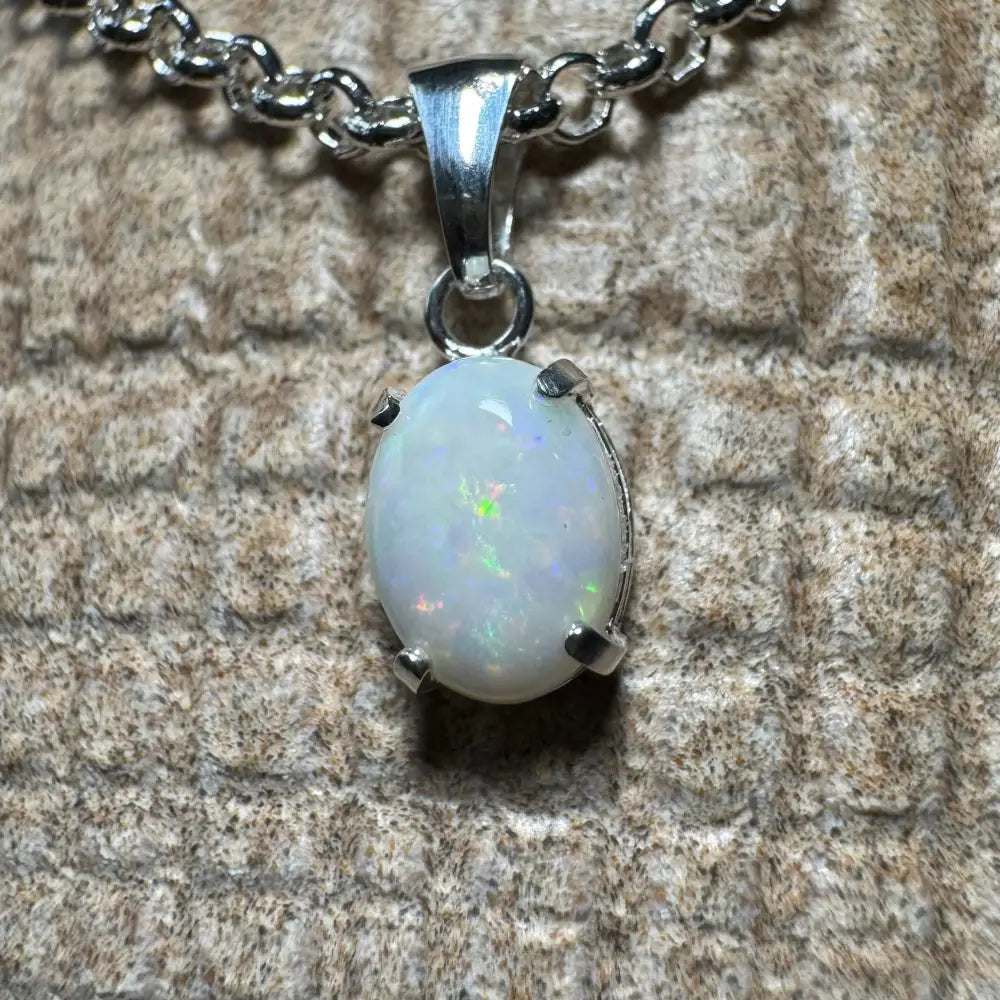 Silver chain necklace with a handcrafted Coober Pedy opal pendant in sterling silver