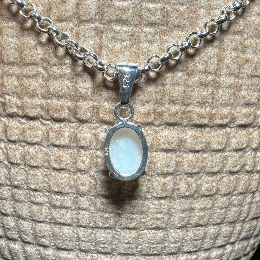 Silver chain necklace with oval Coober Pedy opal pendant from Three Sisters Shine collection