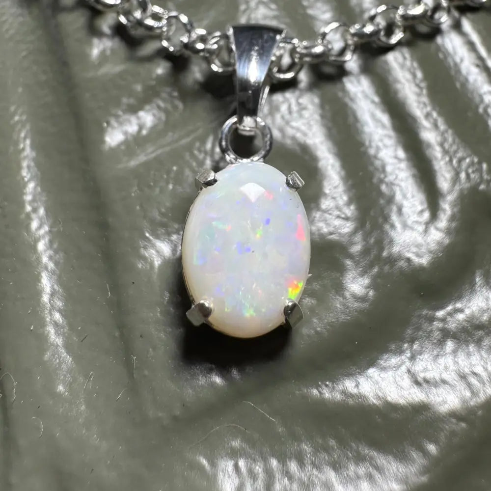 Oval Coober Pedy Opal pendant on sterling silver chain from Three Sisters Shine collection