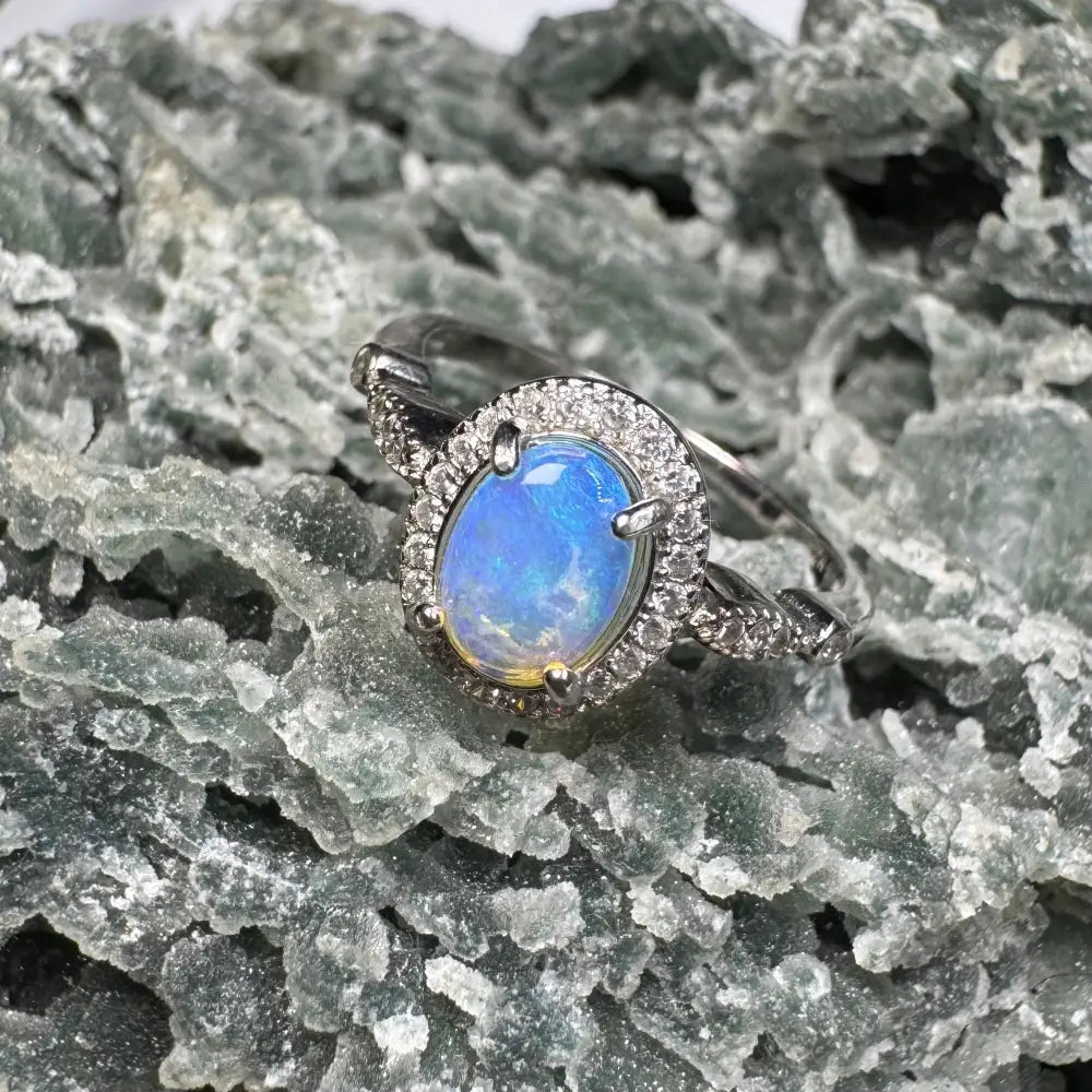 Opal ring with diamond halo from Wave Rock Grace featuring Lightning Ridge Opal and Zirconia
