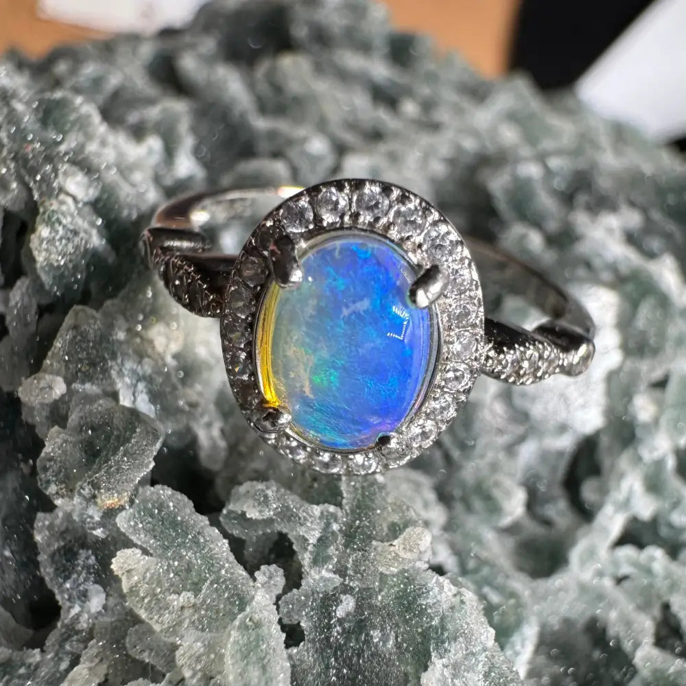 Opal ring with diamond halo from Wave Rock Grace featuring Lightning Ridge Opal and zirconia