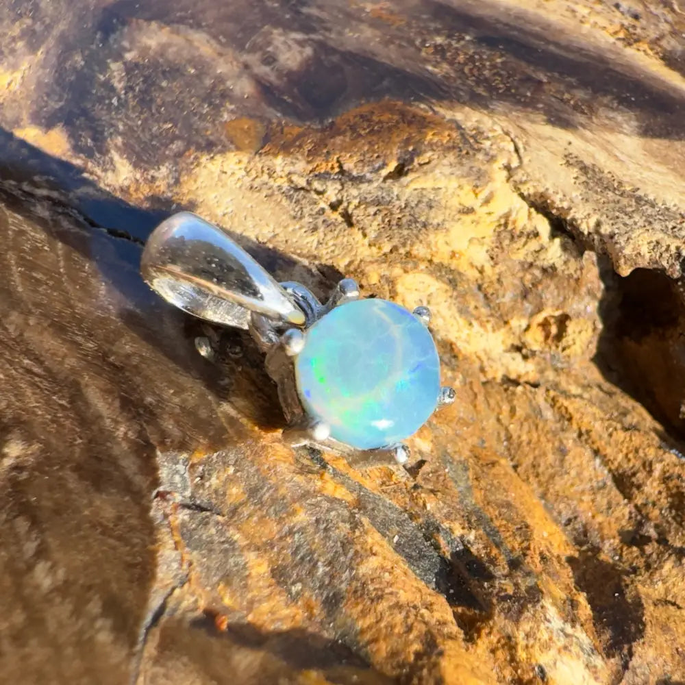 Opal pendant with silver setting from Whale’s Journey handcrafted Lightning Ridge crystal opal