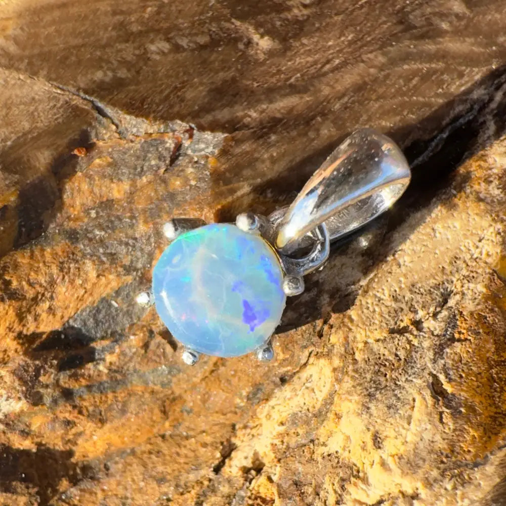 Opal pendant with silver setting from Whale’s Journey handcrafted Lightning Ridge crystal opal