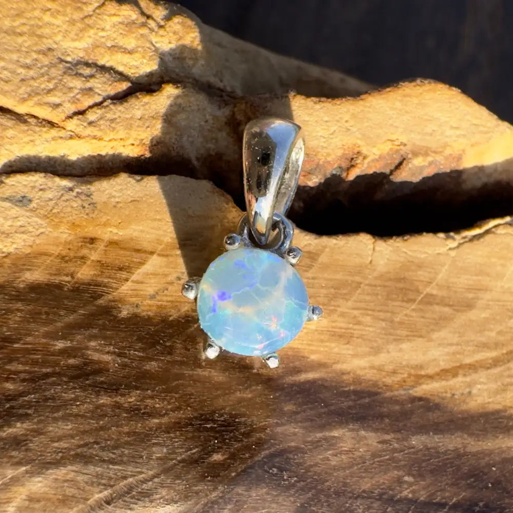 Opal pendant with silver setting from Whale’s Journey handcrafted Lightning Ridge crystal opal
