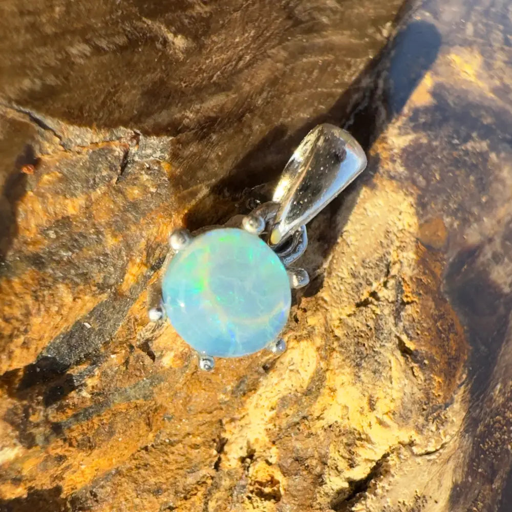 Opal pendant with silver setting from Whale’s Journey handcrafted Lightning Ridge Crystal Opal