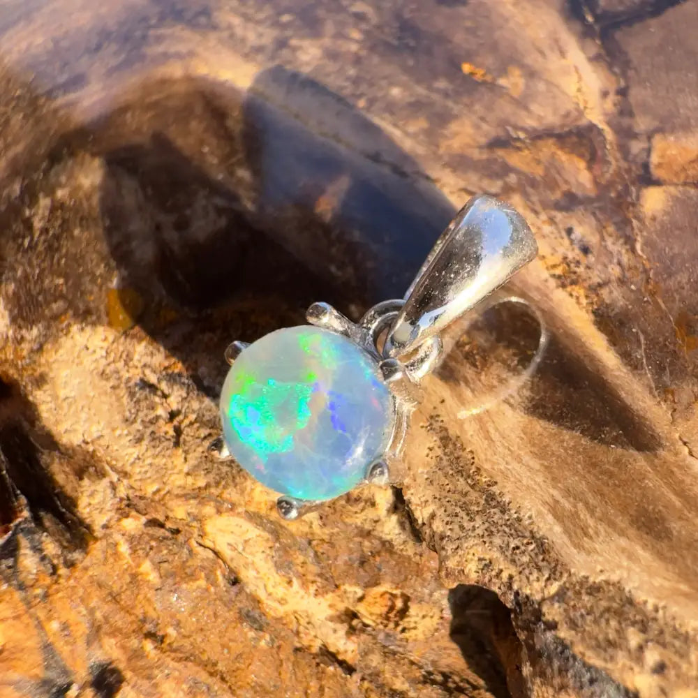 Opal pendant with silver setting from Whale’s Journey handcrafted lightning Ridge crystal opal