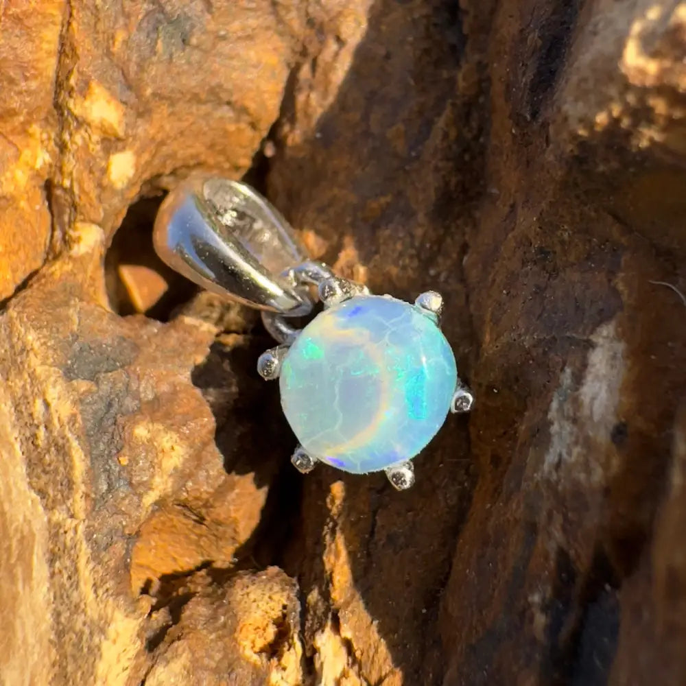 Opal pendant with silver setting from Whale’s Journey handcrafted Lightning Ridge crystal opal