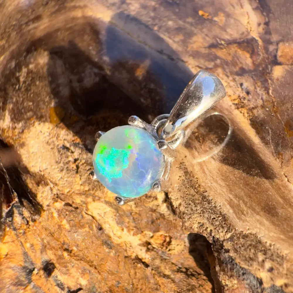 Opal pendant with silver setting from Whale’s Journey Handcrafted Lightning Ridge Crystal Opal