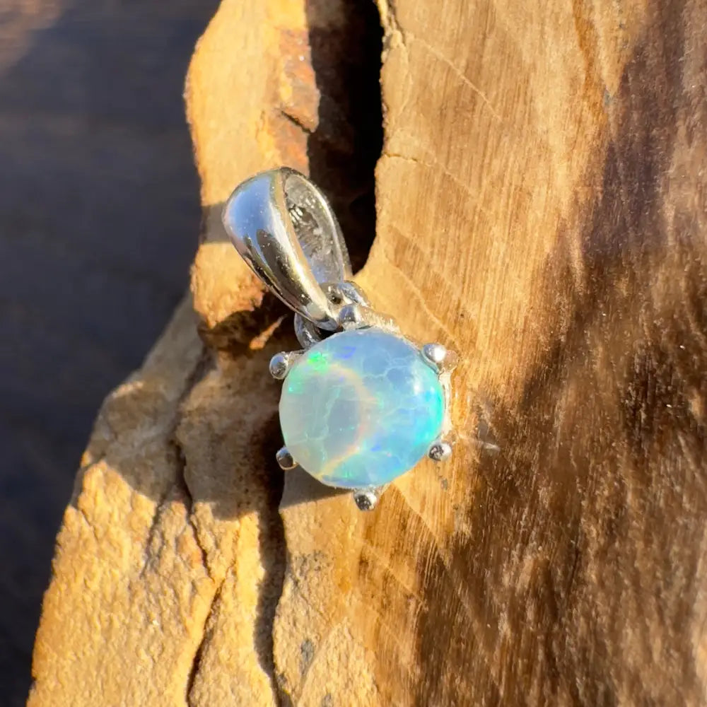 Opal pendant with silver setting from Whale’s Journey handcrafted Lightning Ridge crystal opal jewelry