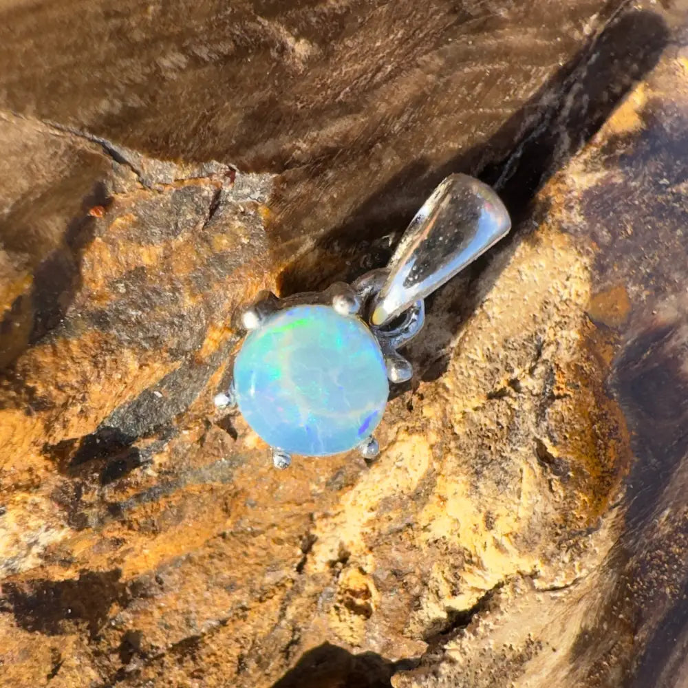 Opal pendant with silver setting from Whale’s Journey handcrafted lightning Ridge crystal opal