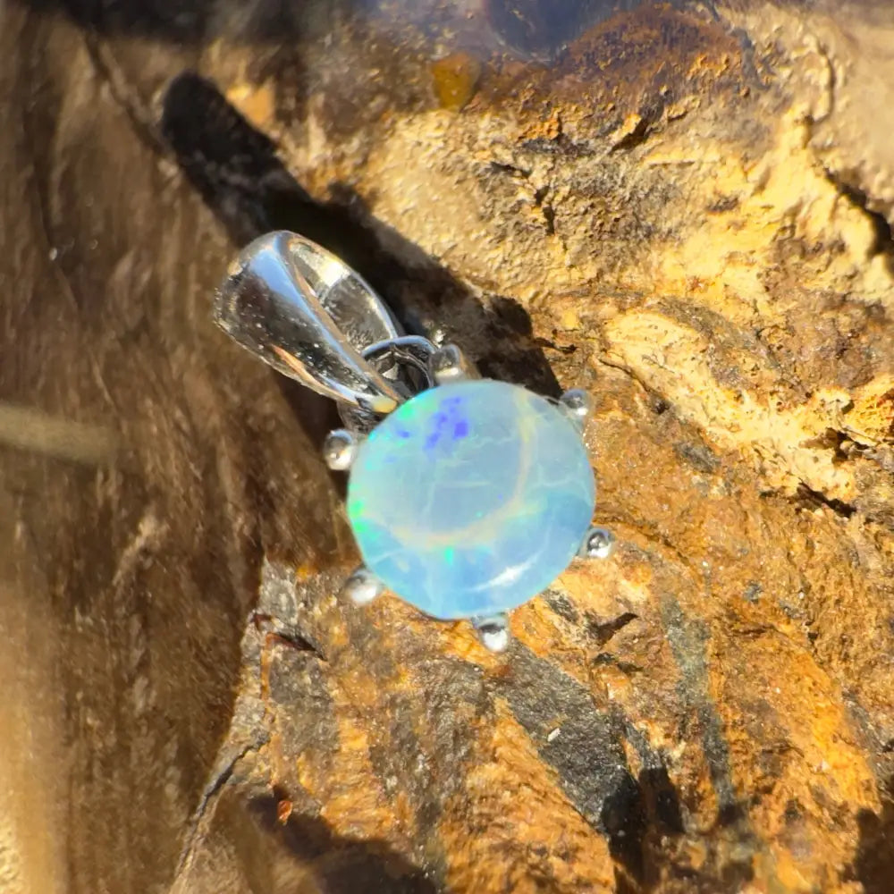 Opal pendant with silver setting from Whale’s Journey handcrafted Lightning Ridge Crystal Opal