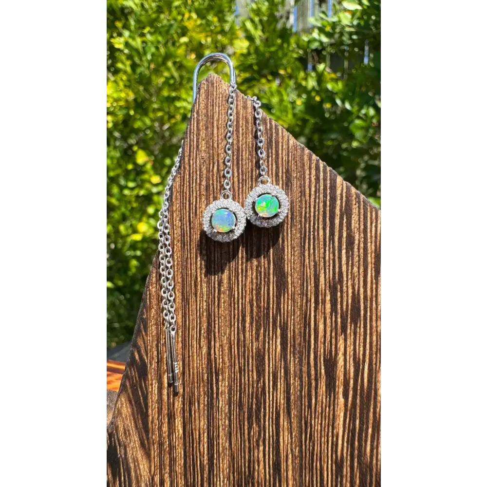 Opal halo drop earrings with 0.7ct Lightning Ridge Opal and cubic zirconia accents