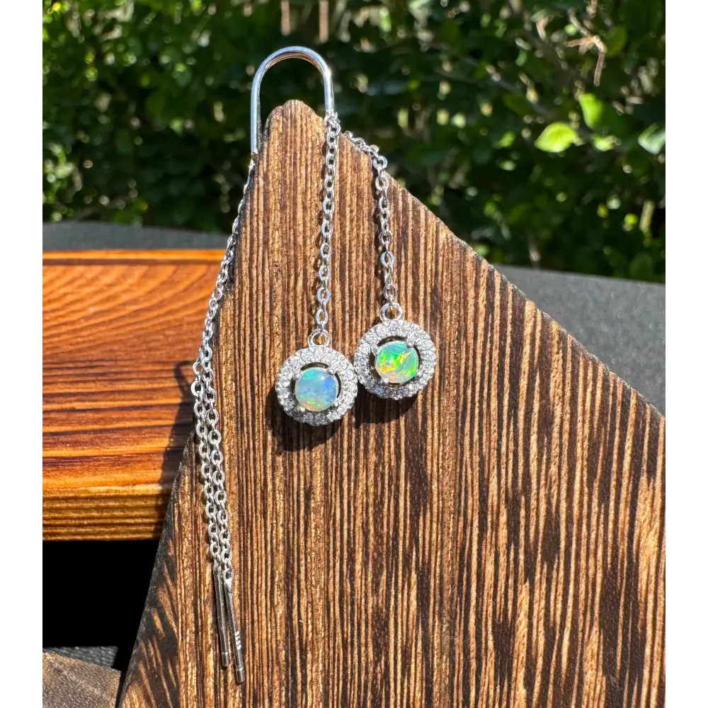 Silver opal halo earrings from Whitsunday Sparkle featuring 0.7ct Lightning Ridge Opal and Cubic Zirconia