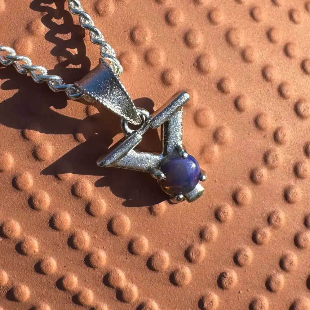 Silver pendant necklace with blue Lightning Ridge Opal and sterling silver craftsmanship