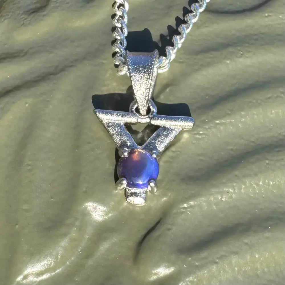 Silver pendant necklace featuring a purple Lightning Ridge Opal in a 925 Sterling Silver setting