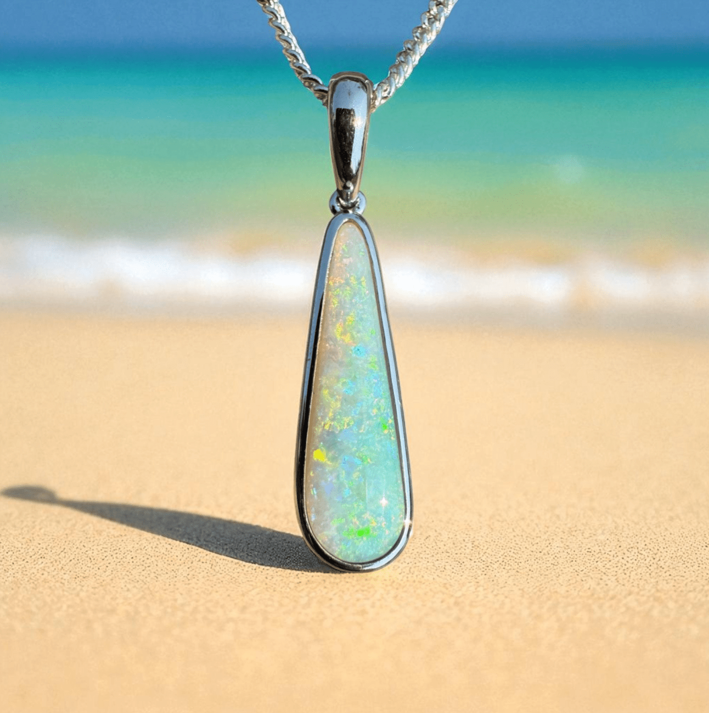 Coober Pedy Glow ~ A pendant shaped by light and tide - Iona Opal Australia
