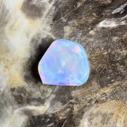 Iridescent blue opal gemstone.