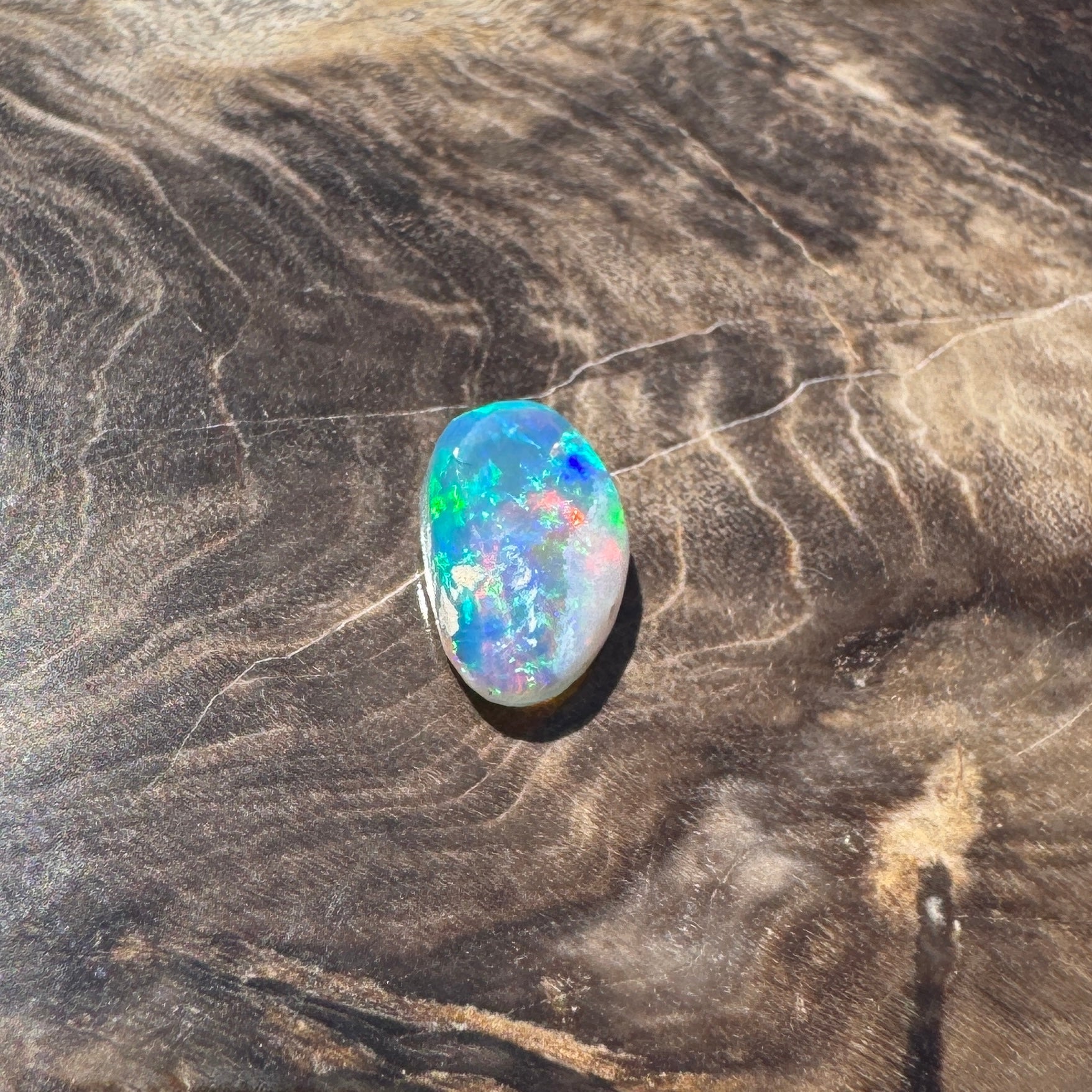 0.9ct Hand - cut Solid Lightning Ridge Opal