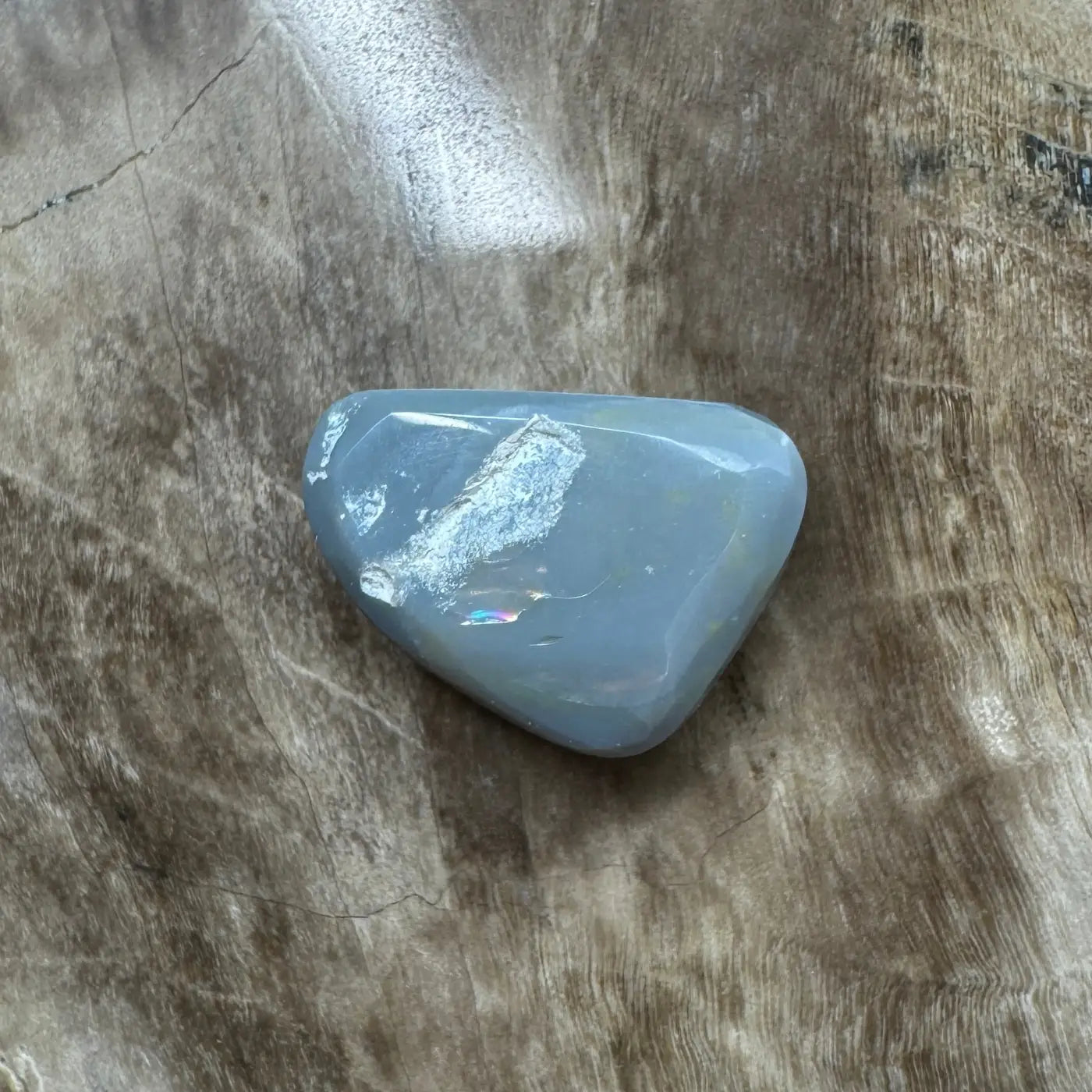 Polished blue gemstone from 1.2ct Hand-Cut Solid Lightning Ridge Black Opal