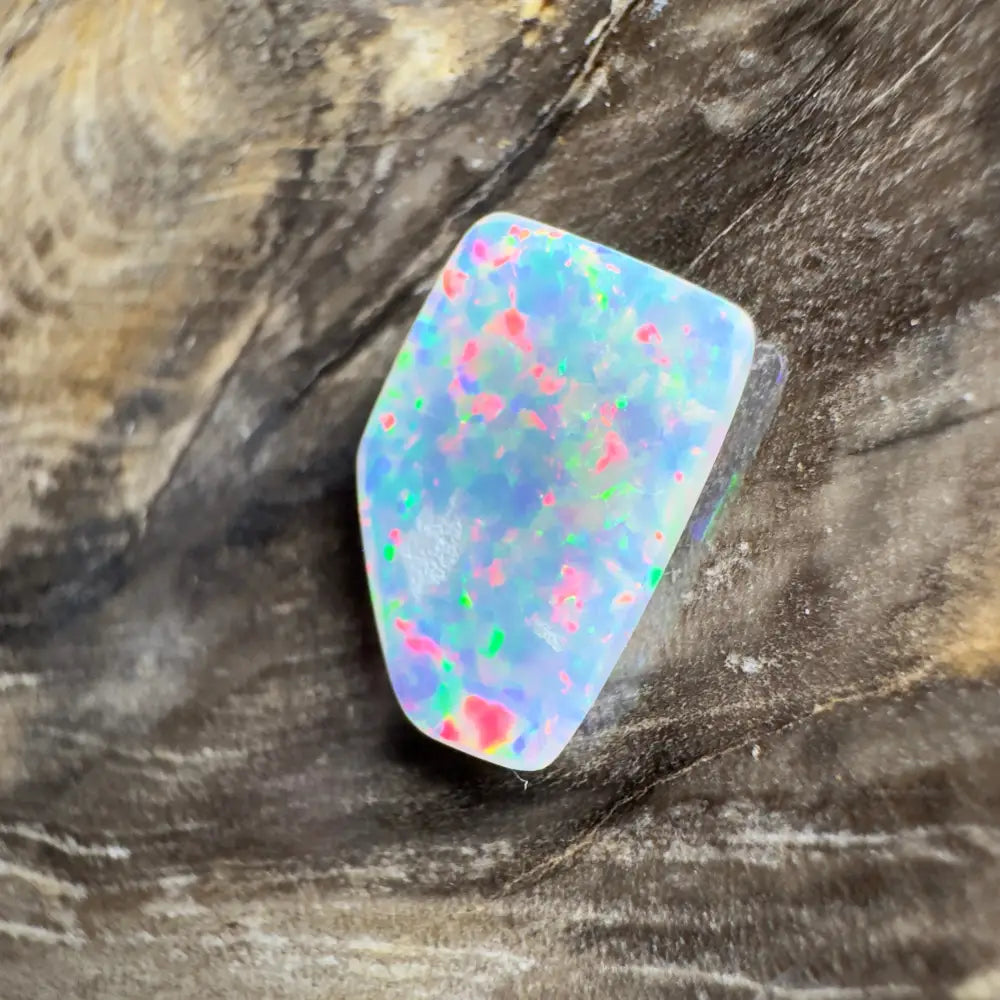Irregularly shaped opal with vibrant color play.