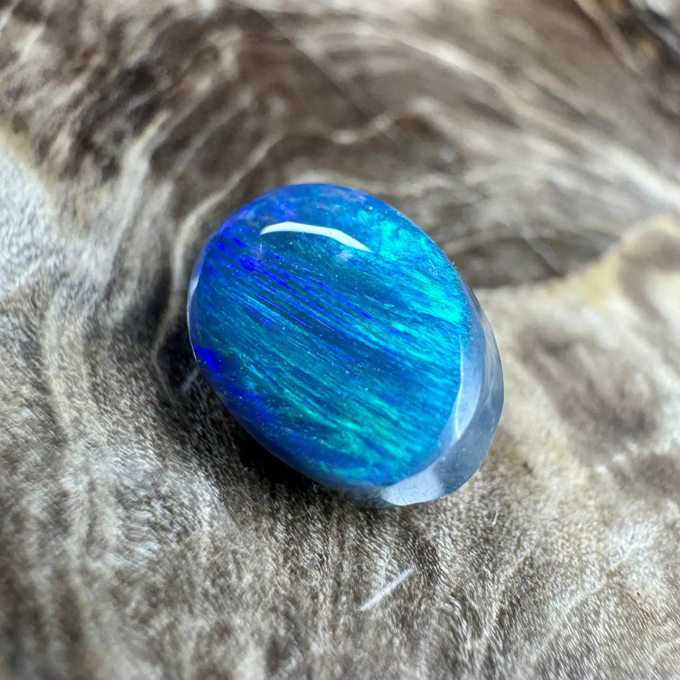 Iridescent blue opal cabochon from 1.4ct Hand-Cut Solid Lightning Ridge Semi Black Opal