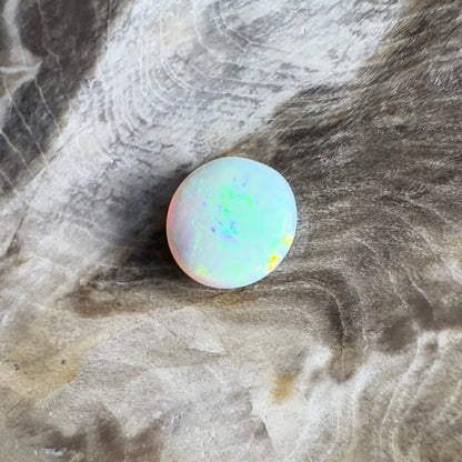Iridescent opal cabochon.