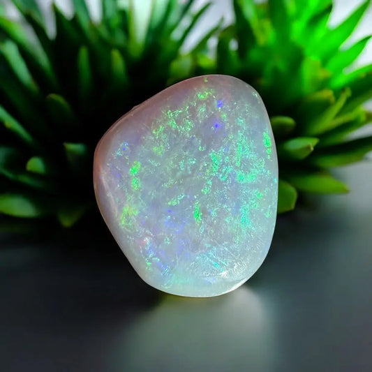 Polished Lightning Ridge opal with vibrant green and blue play-of-color for jewelry
