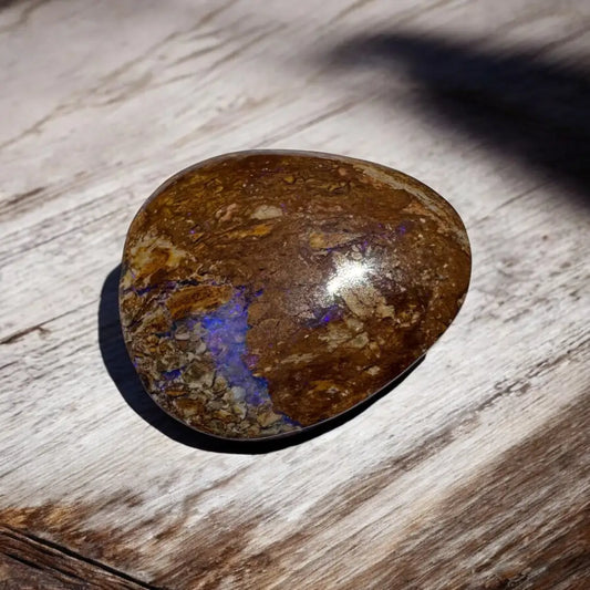 Polished brown opal with blue iridescence from 11.3ct Hand-cut Queensland Boulder Opal