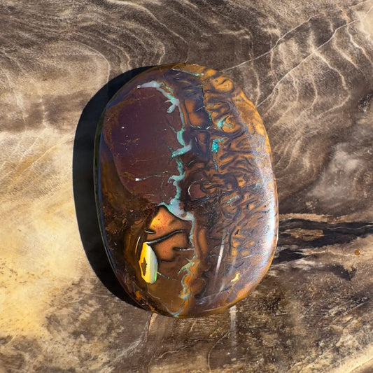 Polished Boulder Opal with Brown and Blue Patterns for the 15.9ct Hand-Cut Solid Boulder Opal