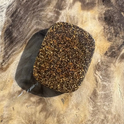 Speckled brown and gold stone.