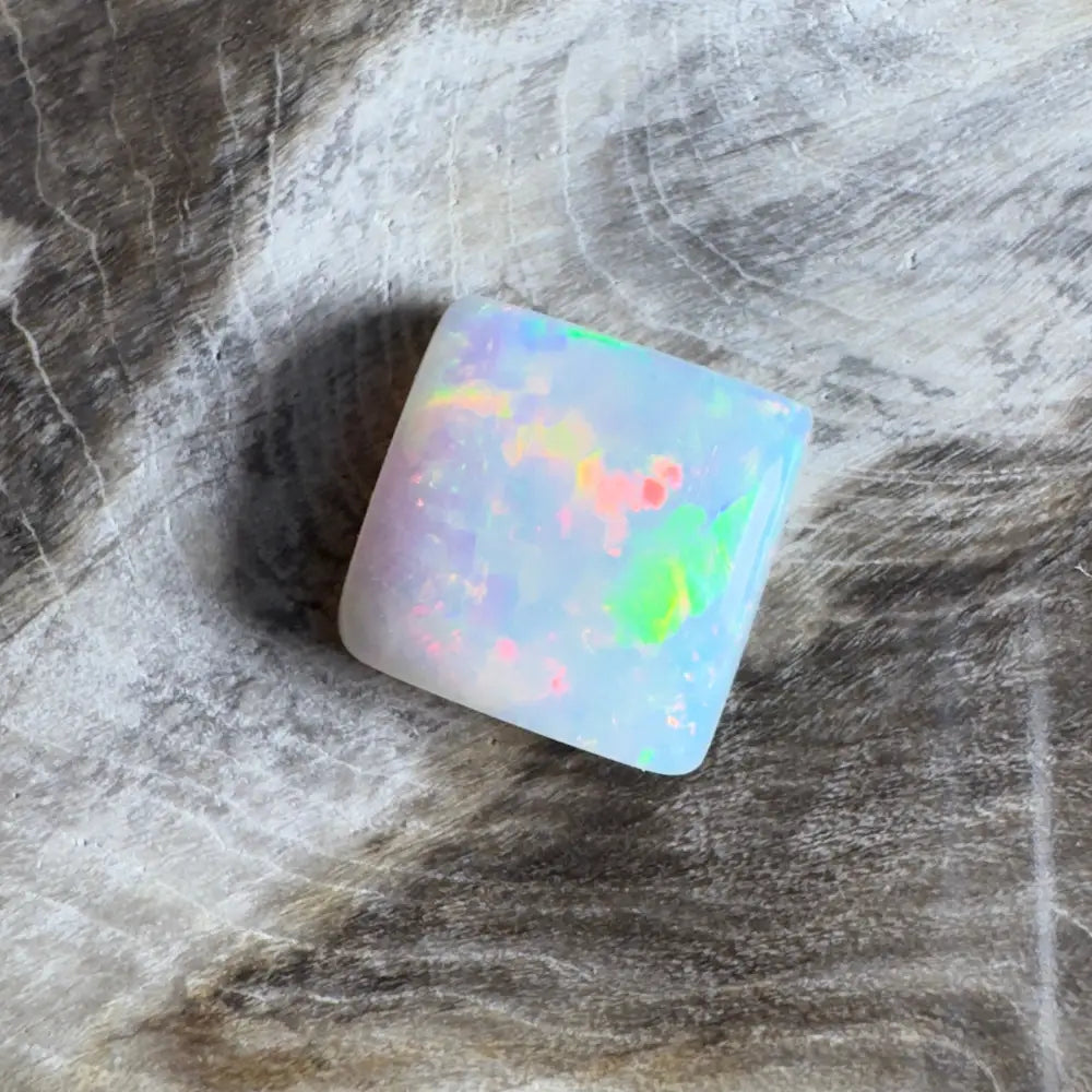 Iridescent, square-cut opal.