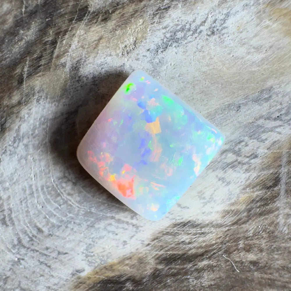 Iridescent white opal gemstone.