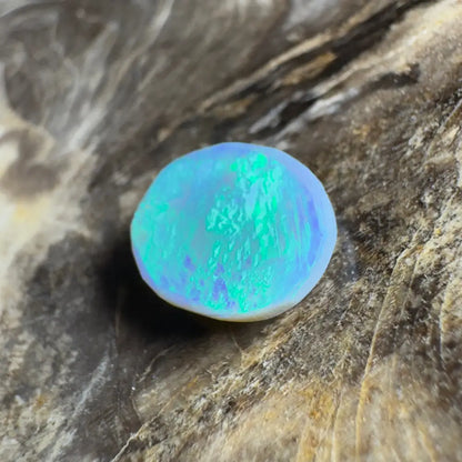 Iridescent opal cabochon.