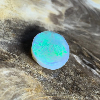 Iridescent opal cabochon.
