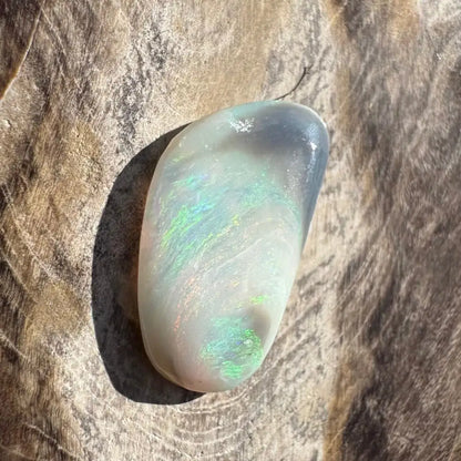 Iridescent white opal gemstone.