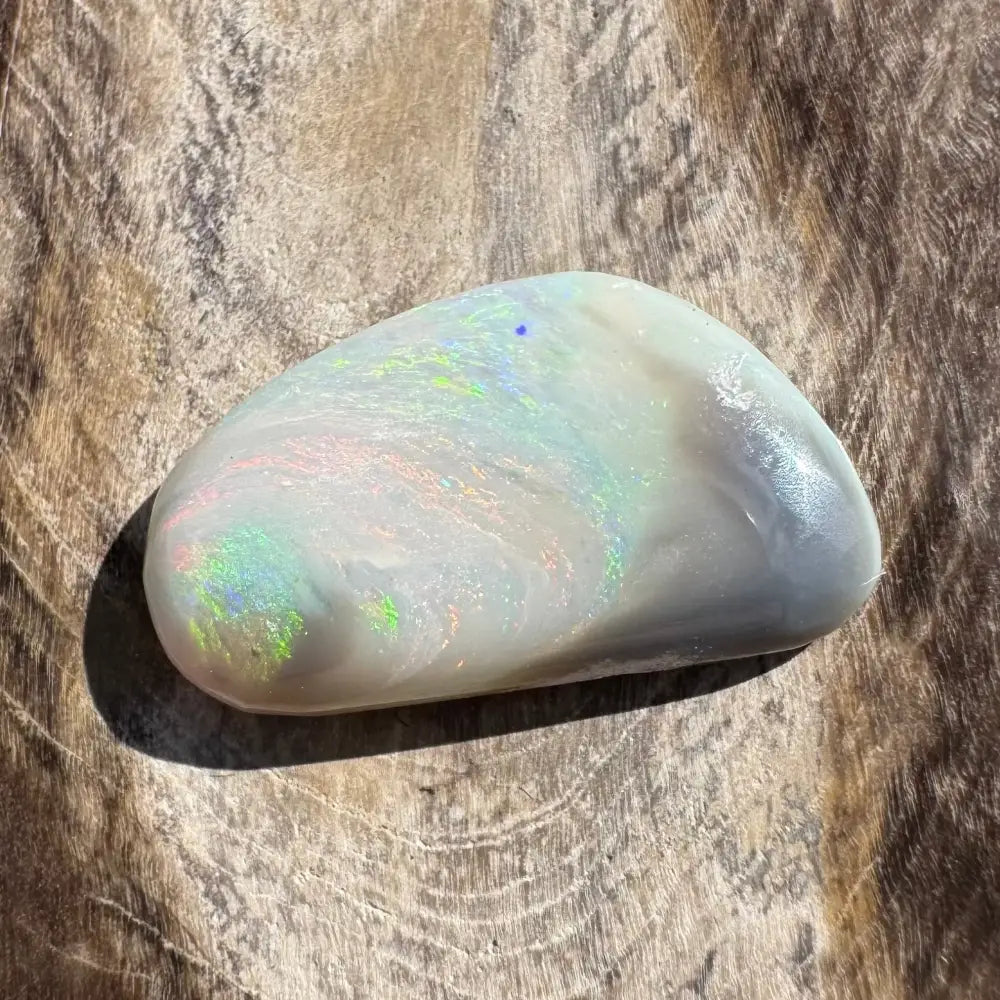 Iridescent white opal gemstone.