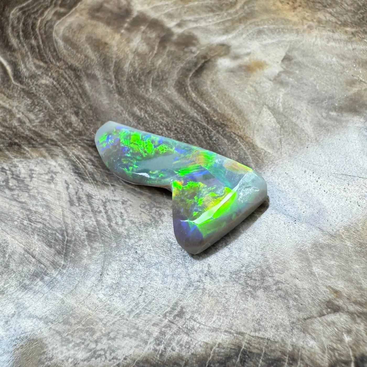 Iridescent Opal Gemstone from Lightning Ridge in a 2.5 Carat Hand-Cut Solid Semi Black Opal Product