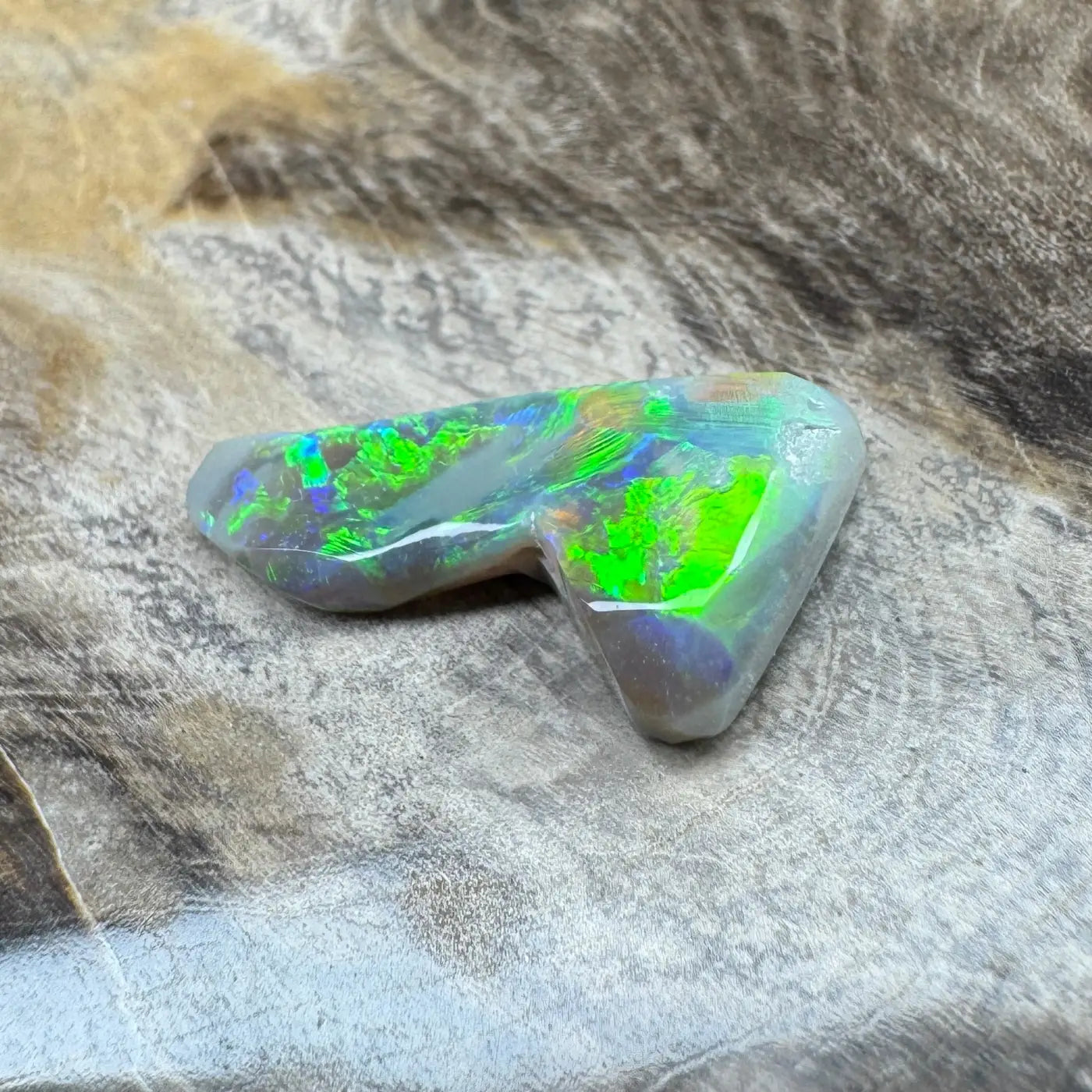 Iridescent opal gemstone in the 2.5ct Hand-Cut Solid Lightning Ridge Semi Black Opal jewelry