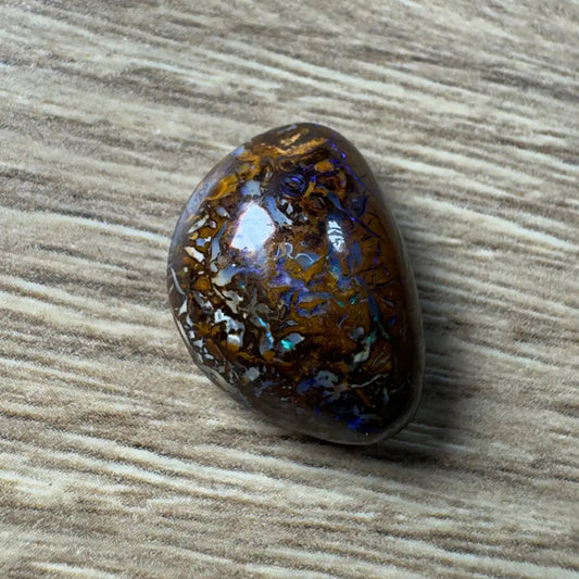 Polished Boulder Opal gemstone from Queensland in a 23.4ct hand-cut display